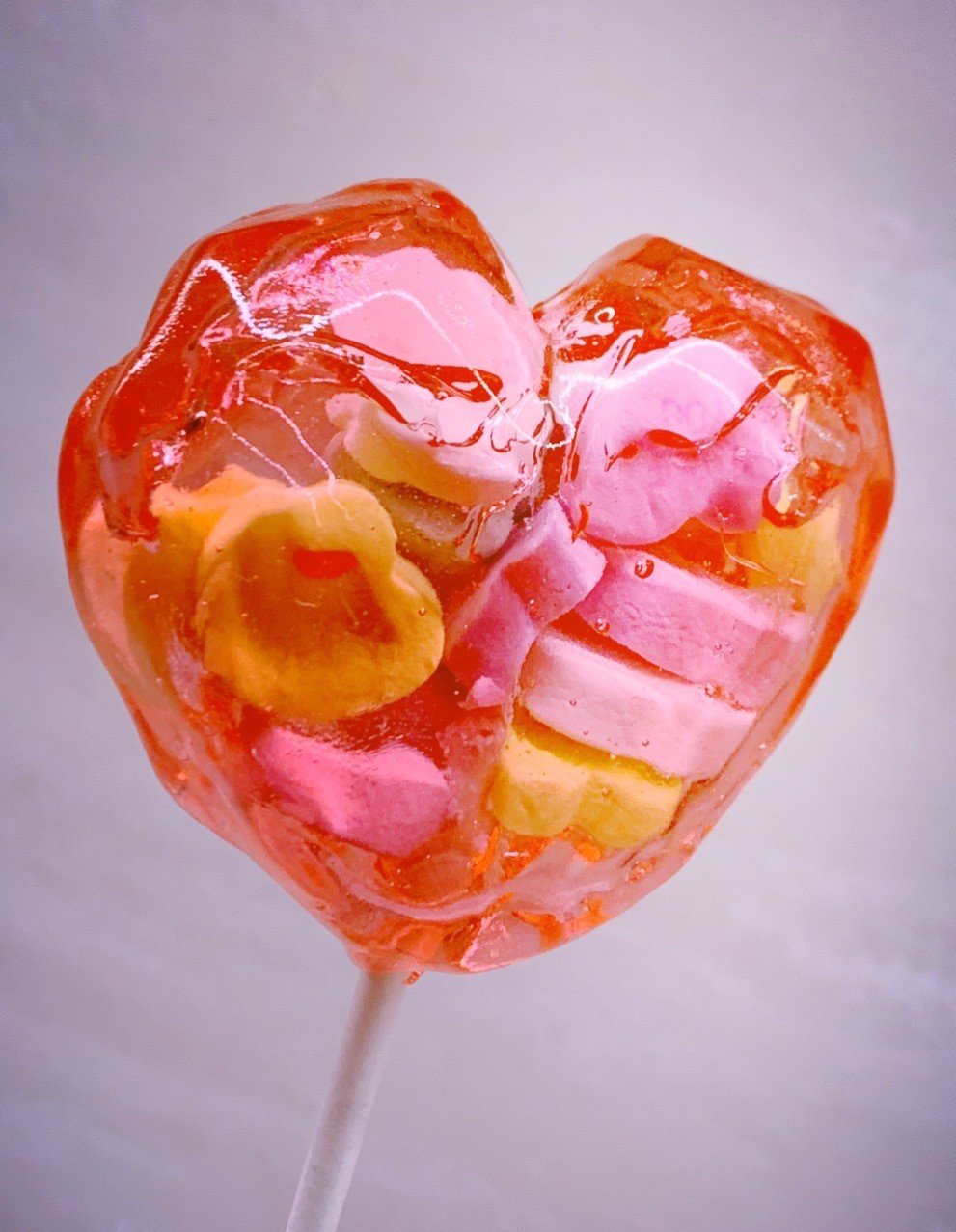 The completed Valentine candy lollipop.